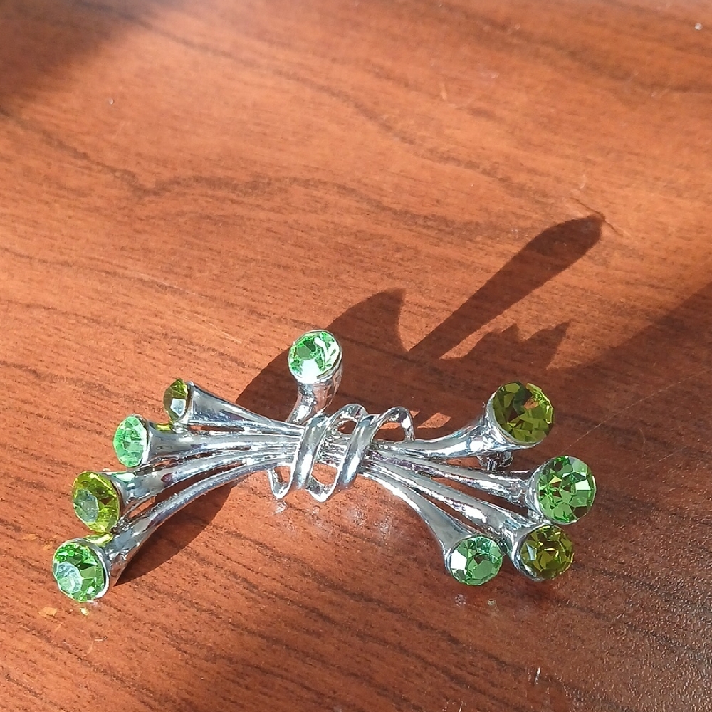 Elegant Silver and Green Brooch